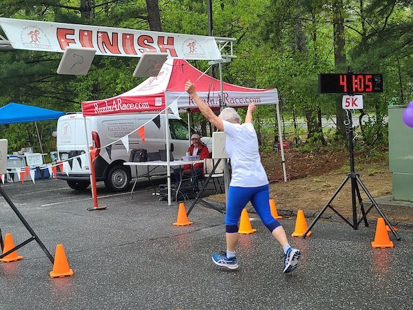 Rita finishing 5K race